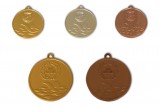 11. Medalla una cara, acabada en oro, plata y cobre. 